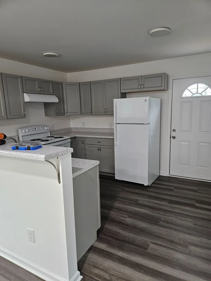 Kitchen renovation with updated cabinets and flooring